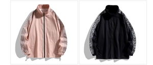 Detail view of pink and black loose fit jackets with paisley patchwork on sleeves