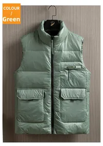 Detail of green quilted down vest featuring utility flap pockets and front zipper