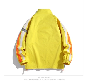 Detailed back view of yellow sports jacket with white sleeve stripes and drawstring hem