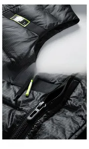 Detail of black grid puffer vest featuring high-quality zipper and decorative woven label