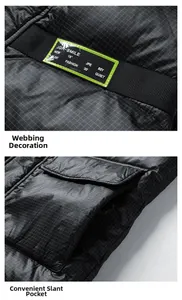 Detail view of men puffer vest featuring green lettered webbing and diagonal pockets