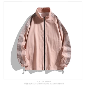 Detail of stand collar jacket featuring paisley print sleeves and adjustable drawstring hem