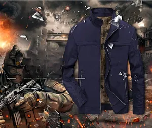 Detail of dark blue military jacket with tactical pockets and map print lining
