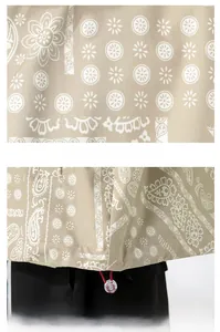 Detail of khaki jacket with paisley print and adjustable drawstring toggle hem