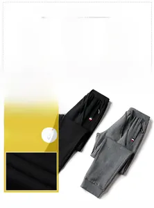 Detailed view of elastic waistband and red-white-blue ribbon on slim fit joggers