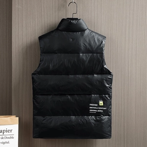 Men's thermal quilted vest in glossy black with stand collar and minimalist back lettering