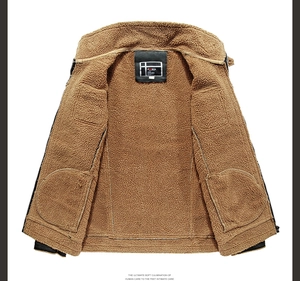 Close-up of men's leather biker jacket featuring a warm brown sherpa fleece lining