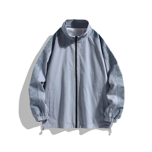 Men's light blue zip-up jacket with paisley patterned sleeves and stand collar
