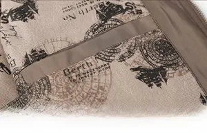 Detailed macro view of khaki jacket inner lining with vintage nautical print and pocket
