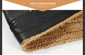Detail of men's leather jacket hem showing thick brown fleece lining and fine stitching