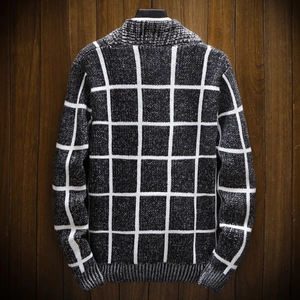 Men's checkered knit cardigan sweater with black and white pattern in a back view