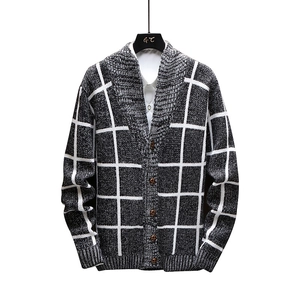 Men's shawl collar knit cardigan with black and white plaid pattern and ribbed cuffs