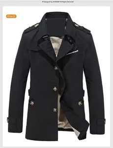 Detail of black military style cotton jacket showing shoulder epaulets and zip chest pockets
