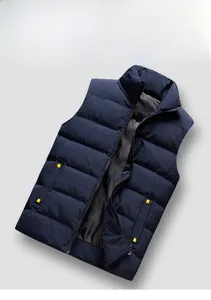 Detailed view of navy blue padded vest featuring a stand collar and yellow pocket tag