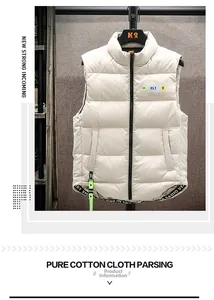 Detail of white down vest showing quilted texture, stand collar, and zipper closure