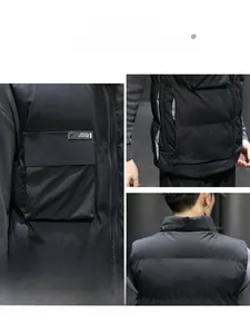 Detail view of black padded vest featuring windproof fabric and reinforced pocket stitching