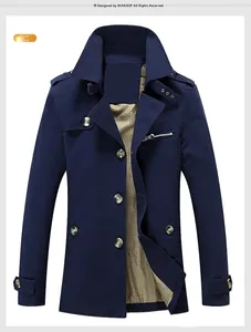 Detail view of navy cotton trench coat featuring classic button closure and plaid lining