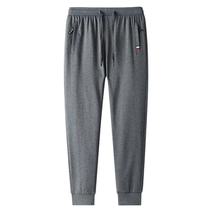 Slim fit dark grey joggers for men with elastic drawstring waist and ribbed cuffs