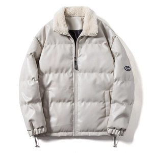 Close-up of cream leather jacket with plush shearling collar and Progress sleeve patch