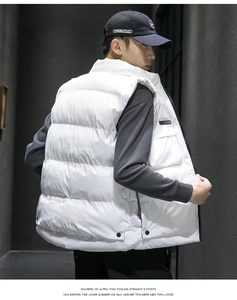 Detail view of white stand collar quilted puffer vest with zipper side pocket for men