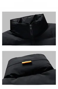 Detail view of the black stand-up collar with dark zipper and yellow webbing on back neck