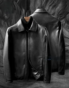 Close-up of the black faux leather jacket showing classic lapel and textured lychee grain