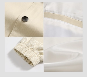 Detail view of cotton twill fabric with metal snap buttons and paisley sleeve prints