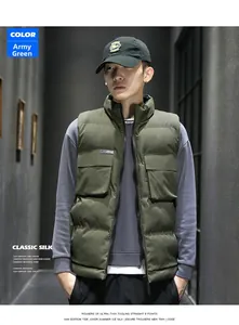 Detail of army green puffer vest featuring windproof zipper and large flap pockets