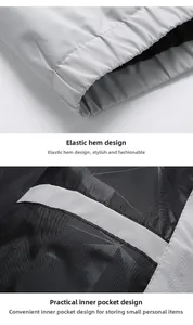 Detail of elastic hem and functional inner pocket on a grey-black lightweight jacket