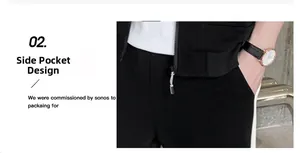 Detail view of black tracksuit pants showing side pocket design and white side stripes