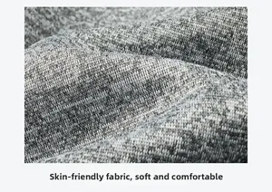 Gros plan sur la texture du tricot gris chiné doux pour ensemble de sweat camouflage