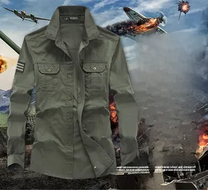 Detail of military style green shirt with dual chest pockets and Free Spirit badge