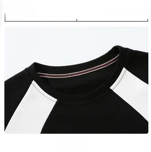 Detail of the crew neck design with red white and green striped interior binding trim