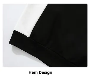 Detail view of black and white contrast hem design on cotton sweatshirt with neat stitching