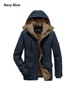 Close-up of navy blue winter jacket featuring thick brown fleece lining and warm hood