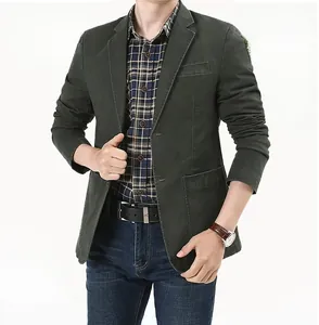 Detail showing a dark green slim fit men's casual blazer with three utility patch pockets