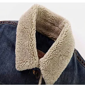 Men's blue denim jacket with warm beige sherpa fleece lining and classic turn-down collar