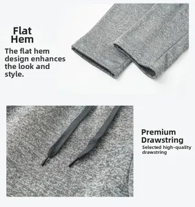 Détail du jogging gris chiné avec ourlets plats et taille ajustable avec cordon