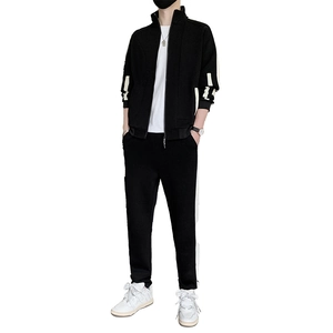 Men's casual tracksuit set featuring zip-up jacket with contrast panels and striped pants
