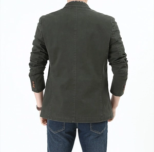 Detail of sleeve cuff with three decorative buttons on slim fit olive casual blazer jacket