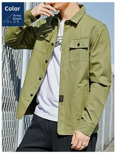 Close-up of military green work shirt featuring double chest pockets with black buttons