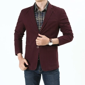 Detail of wine red slim fit blazer featuring notch lapels and large utility patch pockets