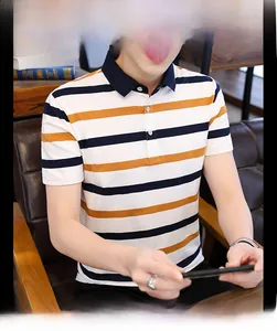 Detail of the navy blue ribbed collar and striped cotton fabric on a men's polo shirt