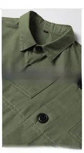 Detail of military green cargo shirt showing collar, buttons and twill cotton fabric