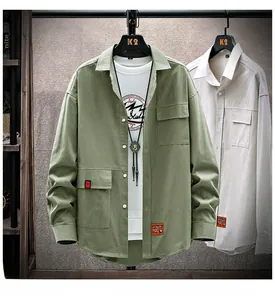 Detail of army green cargo shirt jacket featuring chest utility pockets and casual lapel