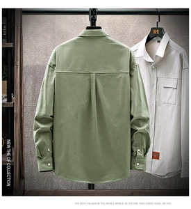 Close-up of khaki casual long sleeve shirt with chest pockets and stylish woven labels