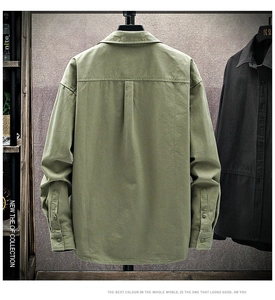 Detail view of the back of a men's army green cotton shirt with dropped shoulder design