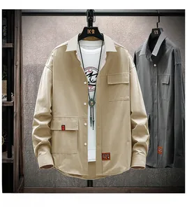 Close-up of khaki casual shirt with contrast collar and functional large utility pockets
