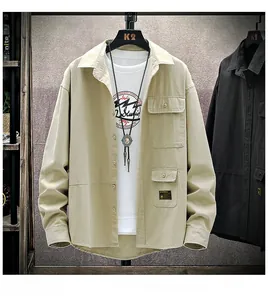 Detail of cargo long sleeve shirt showing chest pocket with brand label and lapel collar