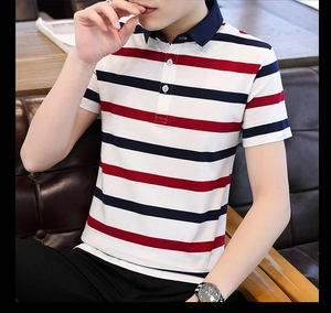 Close-up of the navy ribbed collar and three-button placket on the striped cotton polo shirt